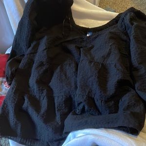 Black women’s 2X crop top with off the shoulder sleeves.